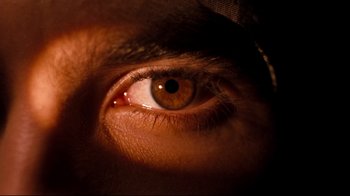 Movie still from “Freddy's Dead: The Final Nightmare” (1991), directed by Rachel Talalay – A man's eye with a brown iris; Extreme Close Up shot, Overhead angle