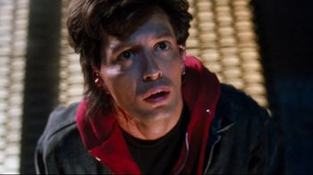 Movie still from “Freddy's Dead: The Final Nightmare” (1991), directed by Rachel Talalay – A man with a red jacket and a black jacket; Close Up shot, Overhead angle