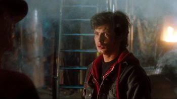 Movie still from “Freddy's Dead: The Final Nightmare” (1991), directed by Rachel Talalay – A man in a black jacket standing next to a ladder; Close Up shot, Low angle