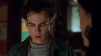 Movie still from “Freddy's Dead: The Final Nightmare” (1991), directed by Rachel Talalay – A young man in a green jacket looking down; Close Up shot, Low angle