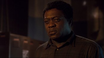 Movie still from “Freddy's Dead: The Final Nightmare” (1991), directed by Rachel Talalay – A person wearing a black shirt; Close Up shot, Low angle