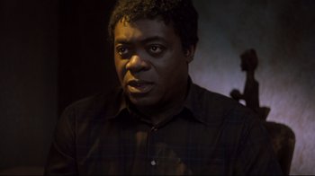 Movie still from “Freddy's Dead: The Final Nightmare” (1991), directed by Rachel Talalay – A person wearing a black shirt; Close Up shot, High angle