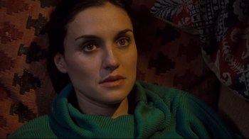 Movie still from “Freddy's Dead: The Final Nightmare” (1991), directed by Rachel Talalay – A person wearing a green sweater; Close Up shot, High angle