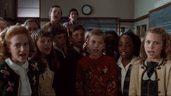 Movie still from “Freddy's Dead: The Final Nightmare” (1991), directed by Rachel Talalay – A group of children standing in front of a chalkboard; Medium shot, High angle