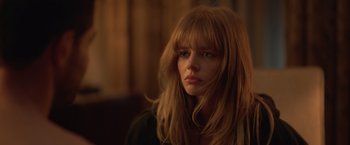 Movie still from “The Valet” (2022), directed by Richard Wong – A beautiful young woman with long , blonde hair; Close Up shot, Low angle