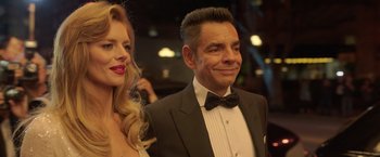 Movie still from “The Valet” (2022), directed by Richard Wong – A man in a tuxedo and a woman in a white dress; Close Up shot, Low angle
