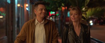 Movie still from “The Valet” (2022), directed by Richard Wong – A man and a woman walking down a street; Medium shot, Over the shoulder angle