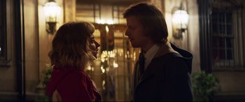 Movie still from “French Exit” (2020), directed by Azazel Jacobs – A man and a woman standing next to each other; Close Up shot, Over the shoulder angle