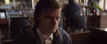 Movie still from “French Exit” (2020), directed by Azazel Jacobs – A person with wet hair; Close Up shot, Low angle