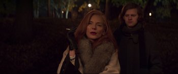 Movie still from “French Exit” (2020), directed by Azazel Jacobs – A woman with red hair wearing a fur coat and leather gloves; Close Up shot, Low angle