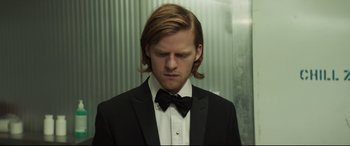 Movie still from “French Exit” (2020), directed by Azazel Jacobs – A man in a suit and a bow tie; Close Up shot, Low angle