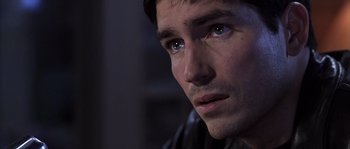 Movie still from “Frequency” (2000), directed by Gregory Hoblit – A man's eyes and face; Close Up shot, Over the shoulder angle