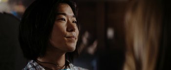 Movie still from “Friday the 13th” (2009), directed by Marcus Nispel – A person with long black hair is looking up; Close Up shot, Low angle