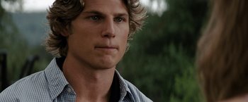 Movie still from “Friday the 13th” (2009), directed by Marcus Nispel – A man's face with trees in the background; Close Up shot, Over the shoulder angle