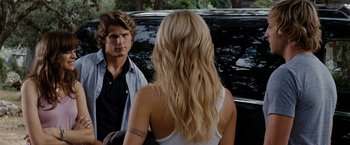 Movie still from “Friday the 13th” (2009), directed by Marcus Nispel – A man and a woman in front of a black car; Medium shot, Over the shoulder angle