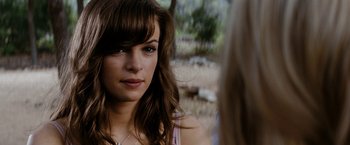 Movie still from “Friday the 13th” (2009), directed by Marcus Nispel – A person wearing a pink shirt; Close Up shot, Over the shoulder angle