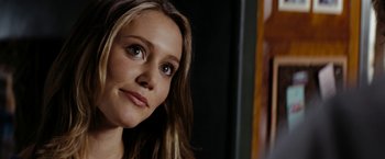 Movie still from “Friday the 13th” (2009), directed by Marcus Nispel – A person with long hair; Close Up shot, Over the shoulder angle