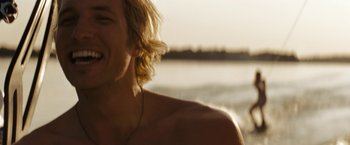 Movie still from “Friday the 13th” (2009), directed by Marcus Nispel – A man's face with the ocean in the background; Close Up shot, Over the shoulder angle