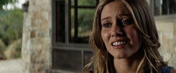 Movie still from “Friday the 13th” (2009), directed by Marcus Nispel – A person with a crying face; Close Up shot, Over the shoulder angle