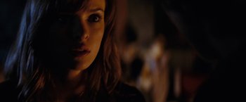 Movie still from “Friday the 13th” (2009), directed by Marcus Nispel – A woman's face in the dark; Close Up shot, Over the shoulder angle