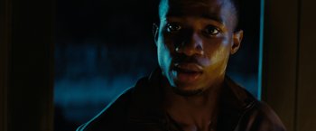 Movie still from “Friday the 13th” (2009), directed by Marcus Nispel – A man's face in the dark; Close Up shot, Low angle