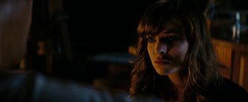 Movie still from “Friday the 13th” (2009), directed by Marcus Nispel – A person with long brown hair; Close Up shot, Over the shoulder angle