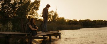 Movie still from “Friday the 13th” (2009), directed by Marcus Nispel – A man and a woman standing on a pier; Wide shot, Over the shoulder angle
