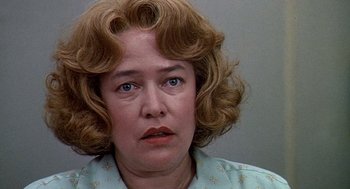 Movie still from “Fried Green Tomatoes” (1991), directed by Jon Avnet – An older woman with blonde curly hair and blue eyes; Close Up shot, Low angle