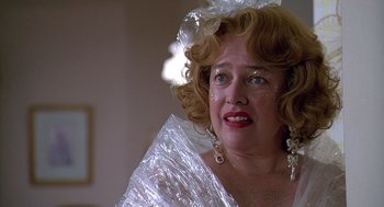 Movie still from “Fried Green Tomatoes” (1991), directed by Jon Avnet – An older woman in a wedding dress with tears in her eyes; Close Up shot, Low angle