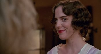 Movie still from “Fried Green Tomatoes” (1991), directed by Jon Avnet – A person wearing a white shirt; Close Up shot, Over the shoulder angle