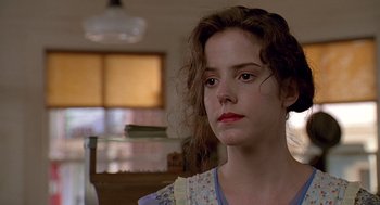 Movie still from “Fried Green Tomatoes” (1991), directed by Jon Avnet – A person wearing a dress; Close Up shot, Low angle