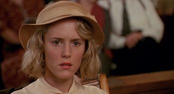 Movie still from “Fried Green Tomatoes” (1991), directed by Jon Avnet – A person wearing a hat; Close Up shot, Over the shoulder angle