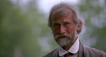 Movie still from “Fried Green Tomatoes” (1991), directed by Jon Avnet – An old man with a beard and a white mustache; Close Up shot, Low angle