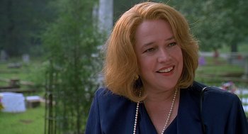 Movie still from “Fried Green Tomatoes” (1991), directed by Jon Avnet – A person wearing a blue shirt; Close Up shot, Over the shoulder angle