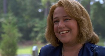 Movie still from “Fried Green Tomatoes” (1991), directed by Jon Avnet – A person wearing a blue shirt; Close Up shot, Over the shoulder angle
