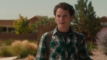 Movie still from “Fright Night” (2011), directed by Craig Gillespie – A young man wearing a green and white plaid shirt; Close Up shot, Over the shoulder angle