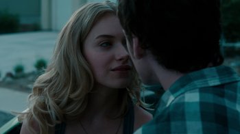Movie still from “Fright Night” (2011), directed by Craig Gillespie – A man and a woman face to face in front of a window; Close Up shot, Over the shoulder angle