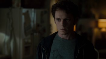 Movie still from “Fright Night” (2011), directed by Craig Gillespie – A man in a green shirt and a black jacket; Close Up shot, Over the shoulder angle