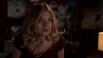 Movie still from “Fright Night” (2011), directed by Craig Gillespie – A beautiful blonde woman with long hair; Close Up shot, Over the shoulder angle