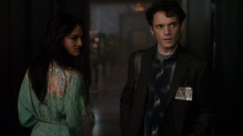 Movie still from “Fright Night” (2011), directed by Craig Gillespie – A man and a woman standing next to each other in a hallway; Medium shot, Over the shoulder angle