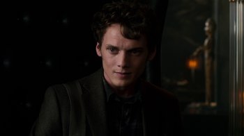 Movie still from “Fright Night” (2011), directed by Craig Gillespie – A man in a suit and tie looking at the camera; Close Up shot, Over the shoulder angle