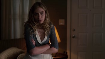 Movie still from “Fright Night” (2011), directed by Craig Gillespie – A beautiful young woman standing in a room; Medium shot, Low angle