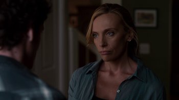 Movie still from “Fright Night” (2011), directed by Craig Gillespie – A woman with blue eyes stares into the camera; Close Up shot, Over the shoulder angle