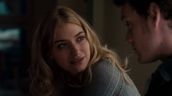 Movie still from “Fright Night” (2011), directed by Craig Gillespie – A beautiful young lady sitting in front of a man; Close Up shot, Over the shoulder angle