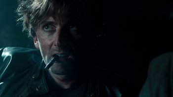Movie still from “Fright Night” (2011), directed by Craig Gillespie – A person smoking a cigarette; Close Up shot, Over the shoulder angle