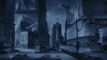 Movie still from “Fritz the Cat” (1972), directed by Ralph Bakshi – An artistic rendering of a city street with buildings and street lights; Extreme Wide shot, High angle