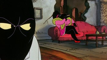 Movie still from “Fritz the Cat” (1972), directed by Ralph Bakshi – A cat is sitting on a couch in a living room; Medium shot, Low angle
