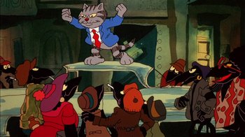 Movie still from “Fritz the Cat” (1972), directed by Ralph Bakshi – A cartoon of a cat wearing a suit standing on top of a car; Wide shot, Low angle
