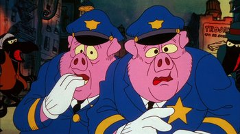 Movie still from “Fritz the Cat” (1972), directed by Ralph Bakshi – Two pigs dressed as police officers are depicted in a cartoon; Close Up shot, Low angle