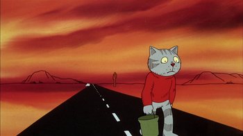 Movie still from “Fritz the Cat” (1972), directed by Ralph Bakshi – A cartoon of a cat walking down a road; Wide shot, Low angle